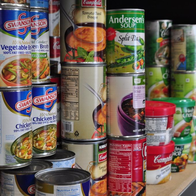 Collection of canned food items in the pantry